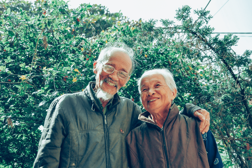 Senior couple posing for a picture