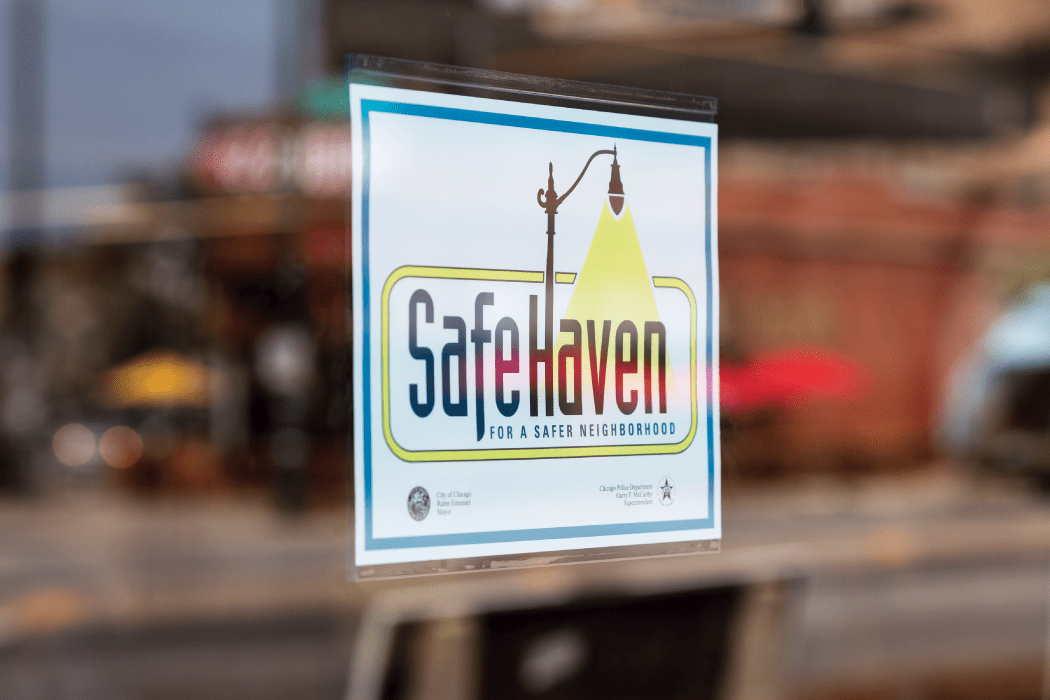 Safe Haven sign hanging in Liberty Bank window
