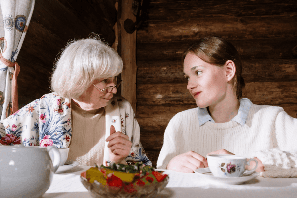 Grandmother and grand-daughter looking at each other