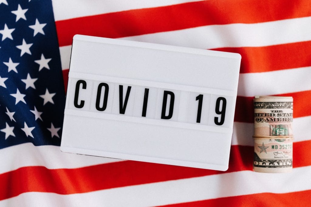 COVID19 sign and American Flag