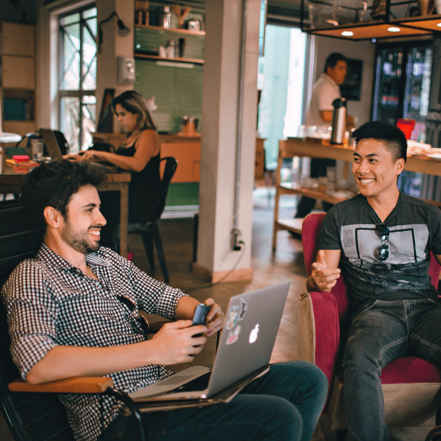 Two friends sitting in a cafe