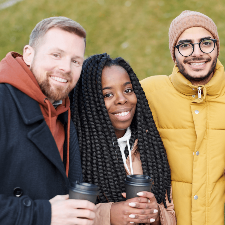 Three people posing for a photo