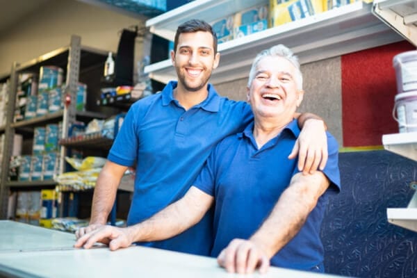 Liberty Bank customers and father and son duo smiling