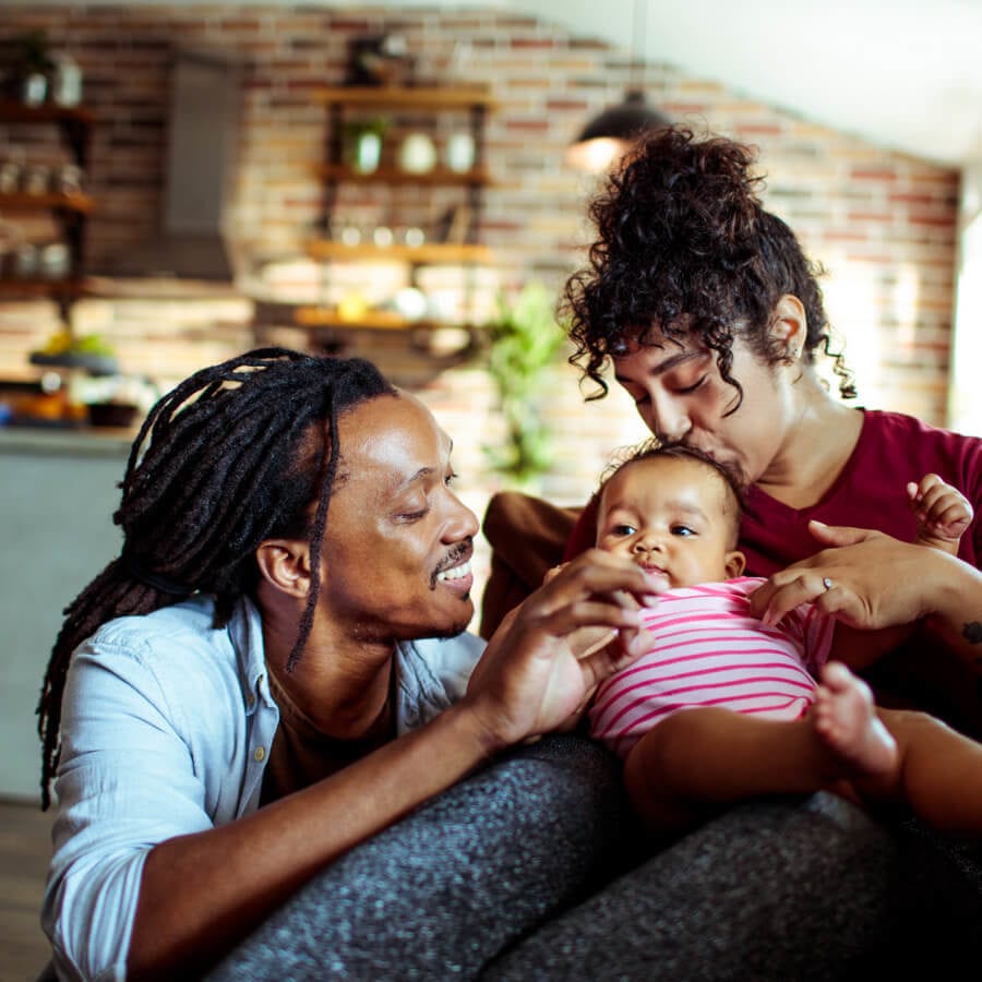 mother and father with their child