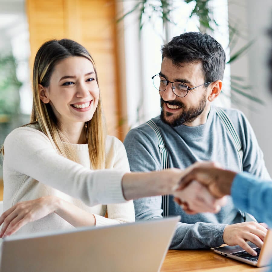 married couple meeting with a banker