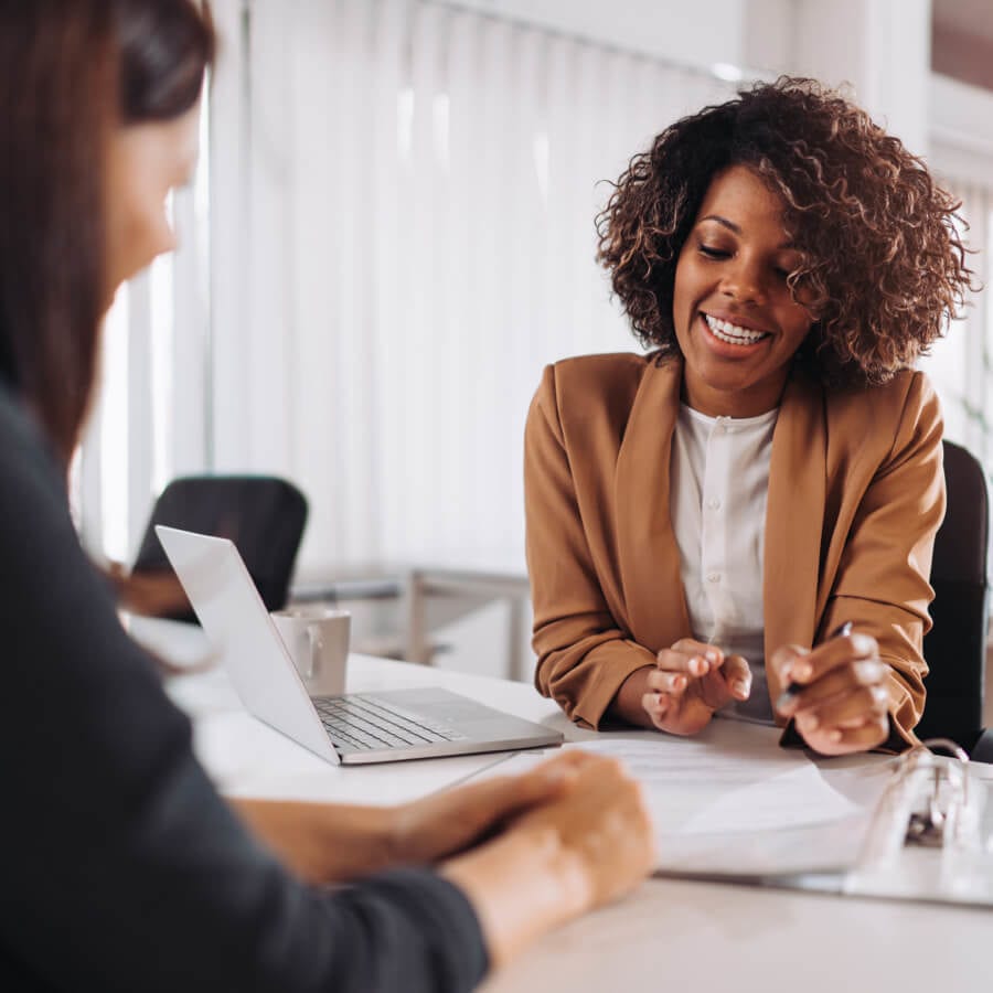 young business woman sitting with a banker