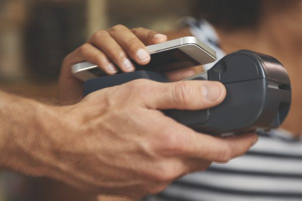 woman using mobile wallet