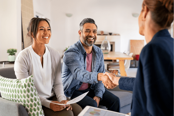 family working with loan officer