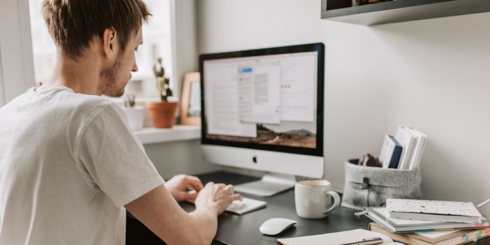 man at computer