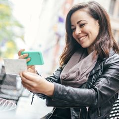 woman using mobile deposit